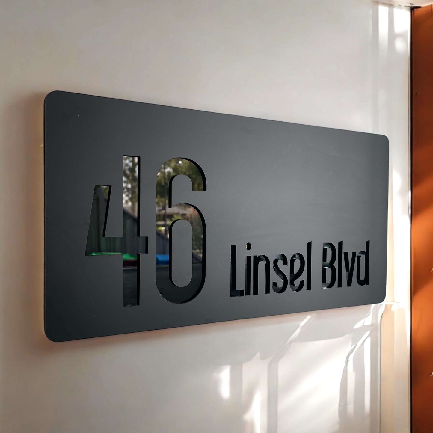 SW2 house number sign with '46 Linsell Blvd' in sleek black design, Australian made, DIY installation, size 320mm x 180mm.