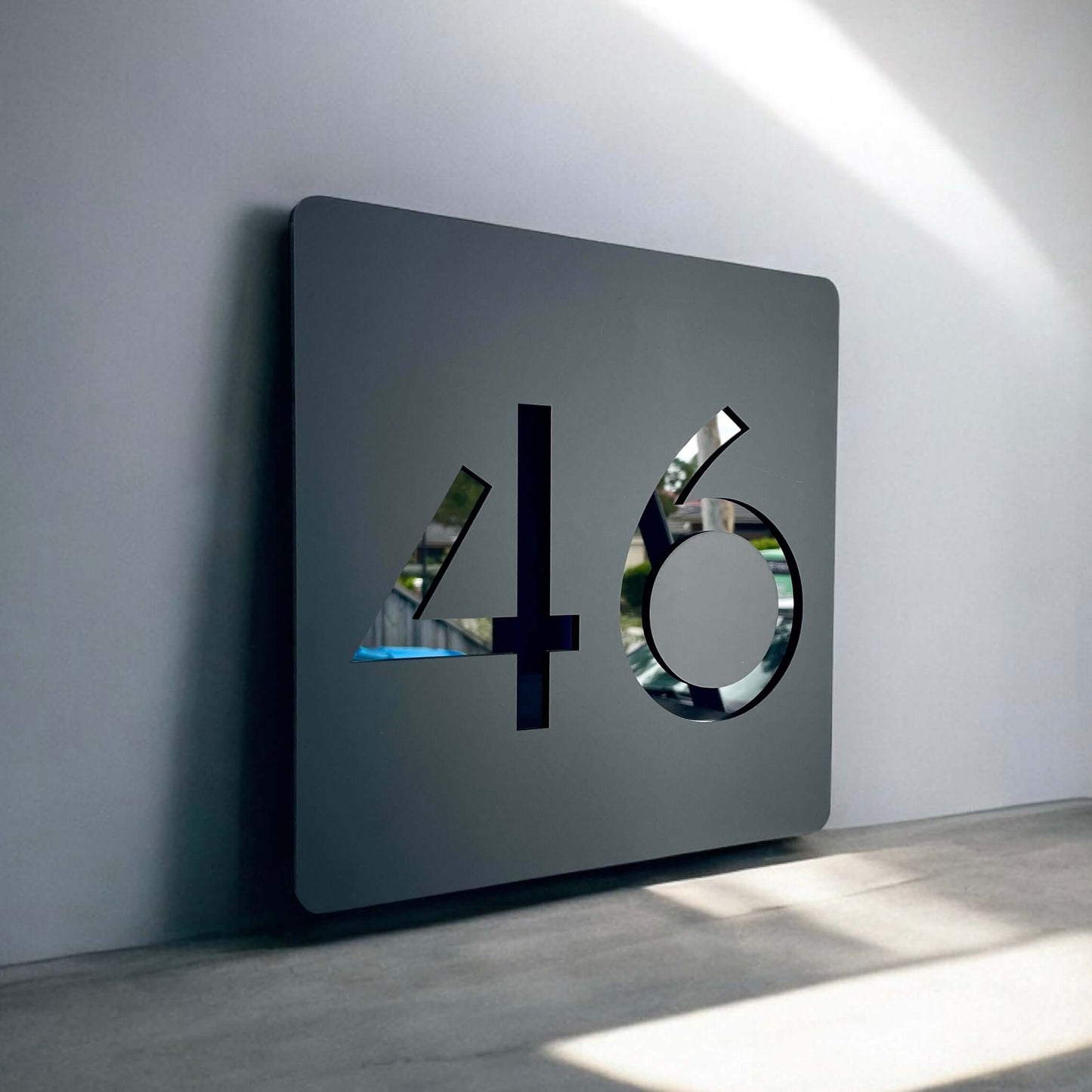Modern SW2 house number sign, Australian made, shown with number 46. Stylish design suitable for outdoor DIY installation.