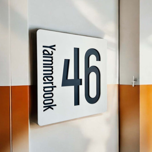 "SW2 house number sign, Australian made, featuring 'Yammerbook' and '46' in black on a 230mm square panel with easy DIY installation."