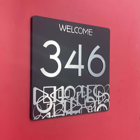 House number sign '346' with modern design on a wall, showcasing a sleek and contemporary style. Ideal for SW2 areas.