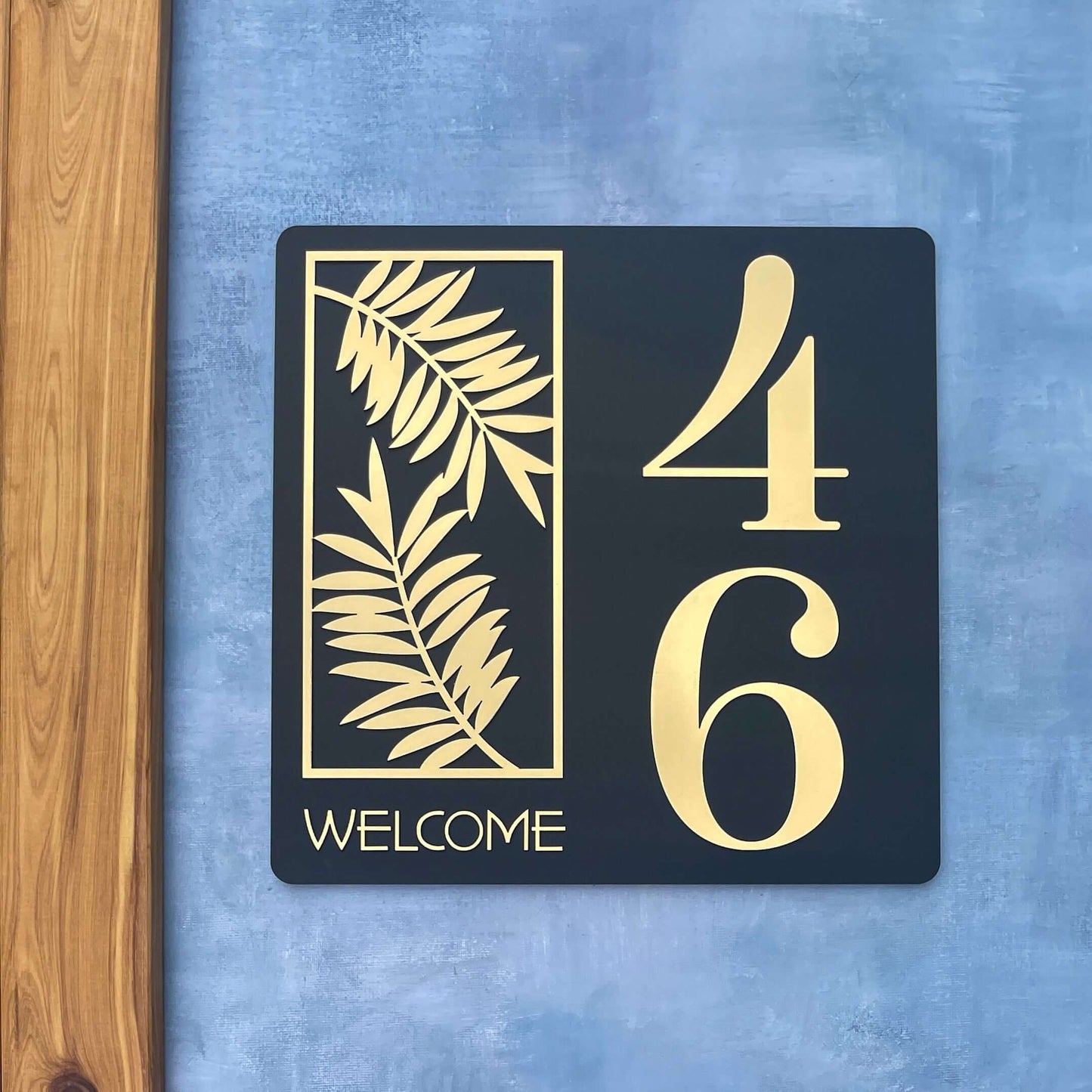 Lustre SV3 house number sign with a leaf design and the number 46, Australian made, suitable for flat surfaces.